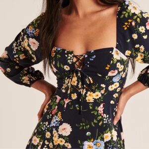 Abercrombie and Fitch navy floral long sleeve lace up mini dress.